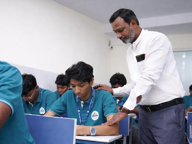 Students studying in a disciplined campus environment at Vijetha College